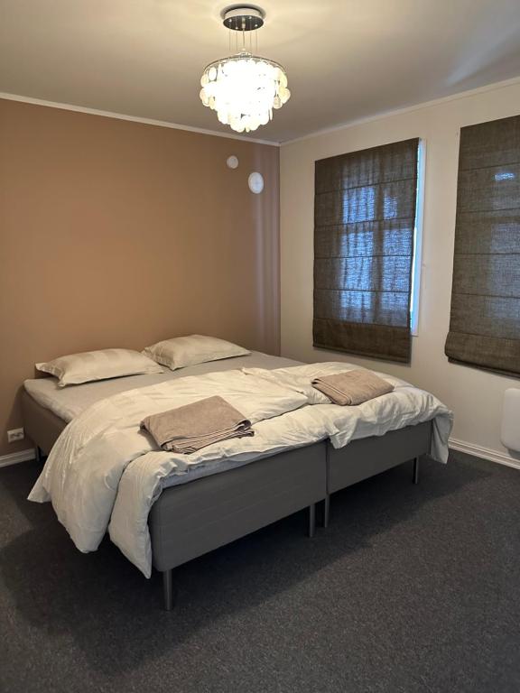 Llit o llits en una habitació de Enjoy Entire Condo near Stavanger airport