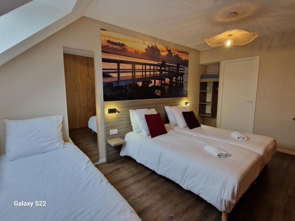 Postel nebo postele na pokoji v ubytování Hotel Eisenhower