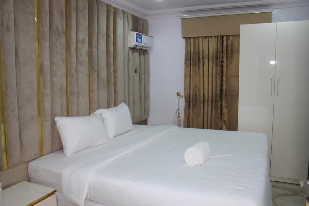 Postel nebo postele na pokoji v ubytování White Gold Hotel