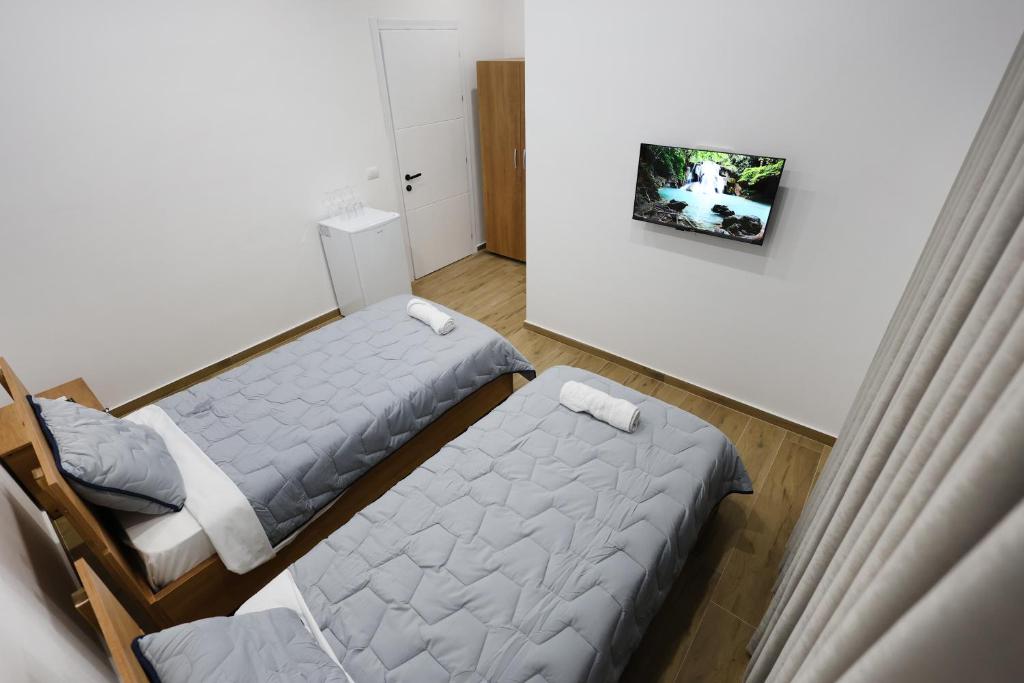 Postel nebo postele na pokoji v ubytování Guesthouse Aurel