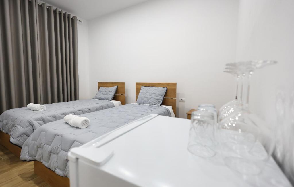 Postel nebo postele na pokoji v ubytování Guesthouse Aurel