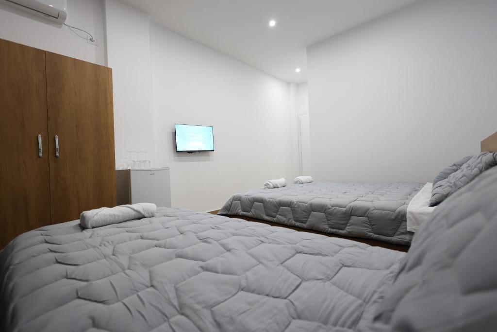 Postel nebo postele na pokoji v ubytování Guesthouse Aurel
