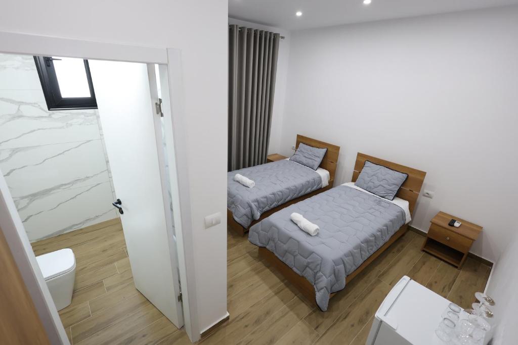 Postel nebo postele na pokoji v ubytování Guesthouse Aurel