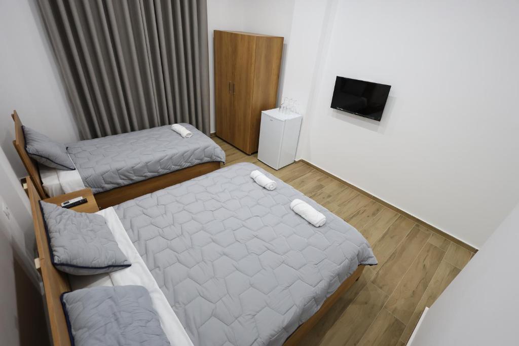 Postel nebo postele na pokoji v ubytování Guesthouse Aurel
