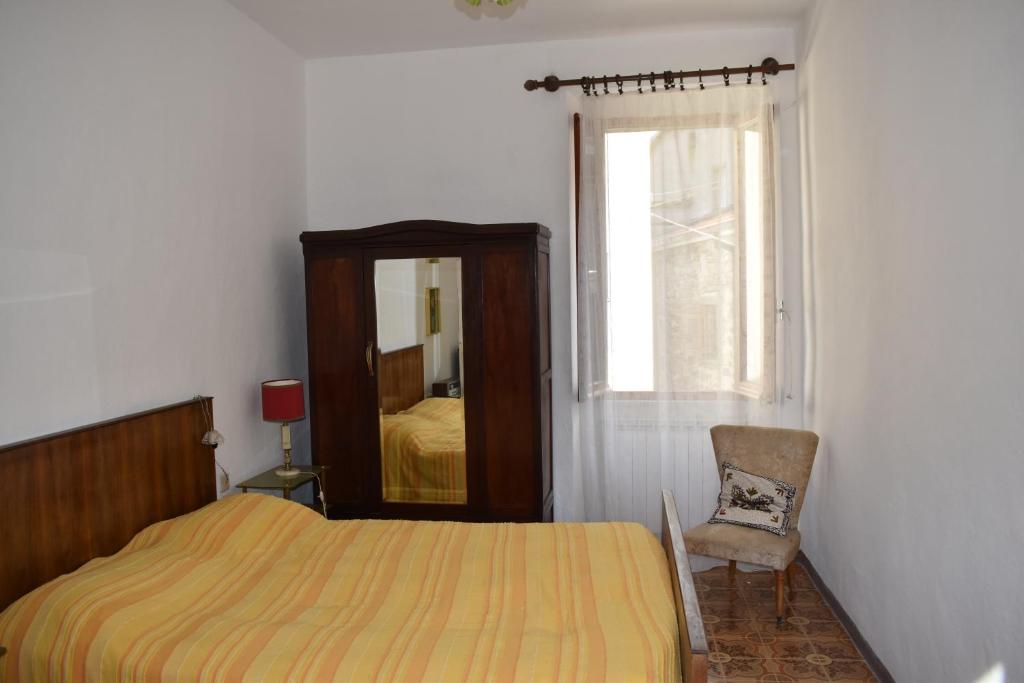 Postel nebo postele na pokoji v ubytování Casa di Alice
