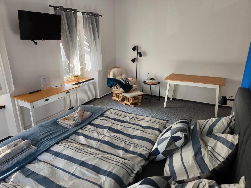 Postel nebo postele na pokoji v ubytování B&B Royal Liberty
