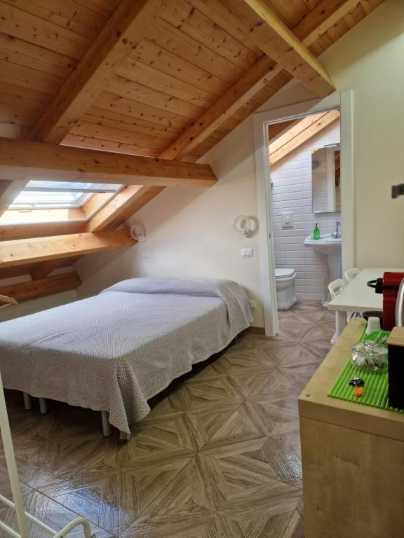 Postel nebo postele na pokoji v ubytování App C Duomo Messina