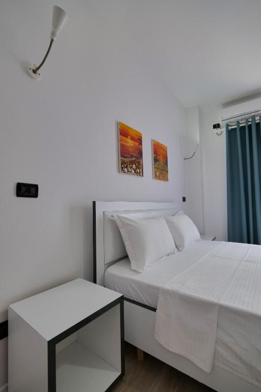 Postel nebo postele na pokoji v ubytování El Mare Hotel
