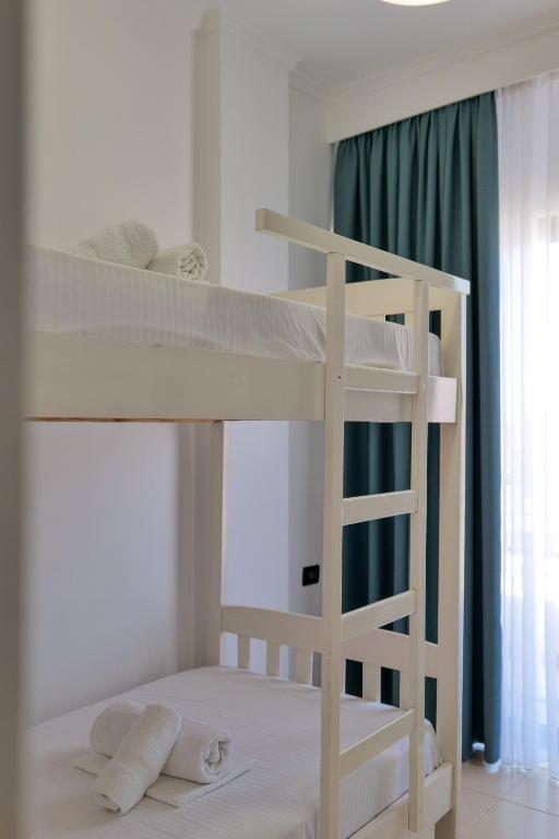 Postel nebo postele na pokoji v ubytování El Mare Hotel