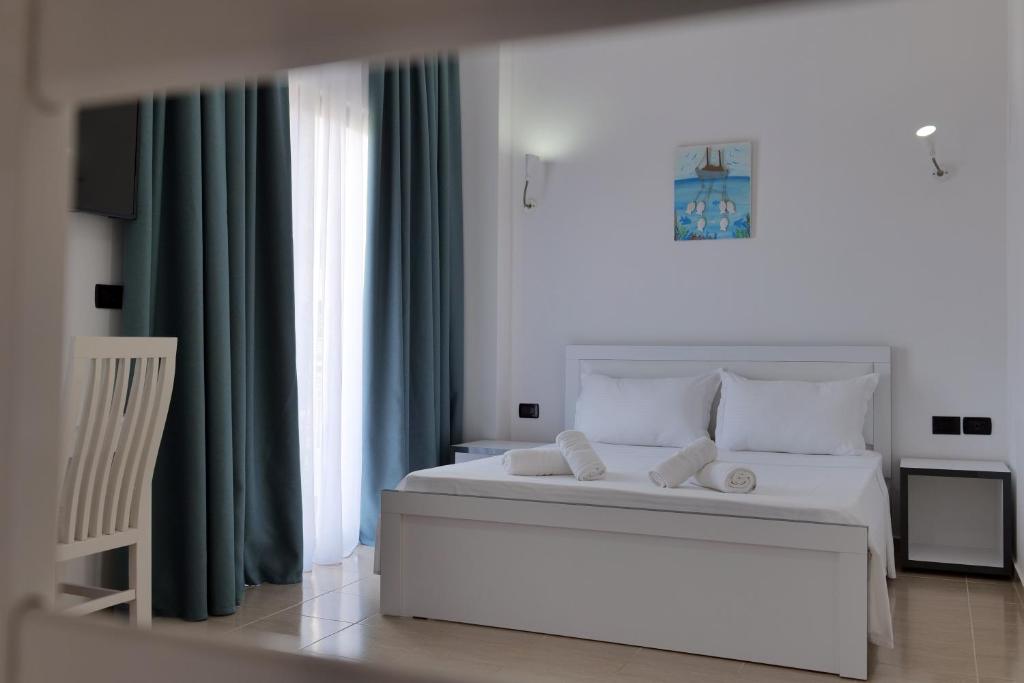 Postel nebo postele na pokoji v ubytování El Mare Hotel