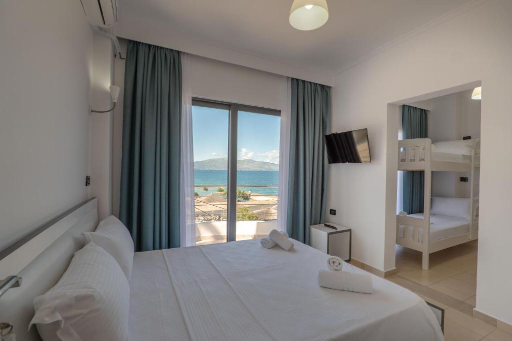 Postel nebo postele na pokoji v ubytování El Mare Hotel