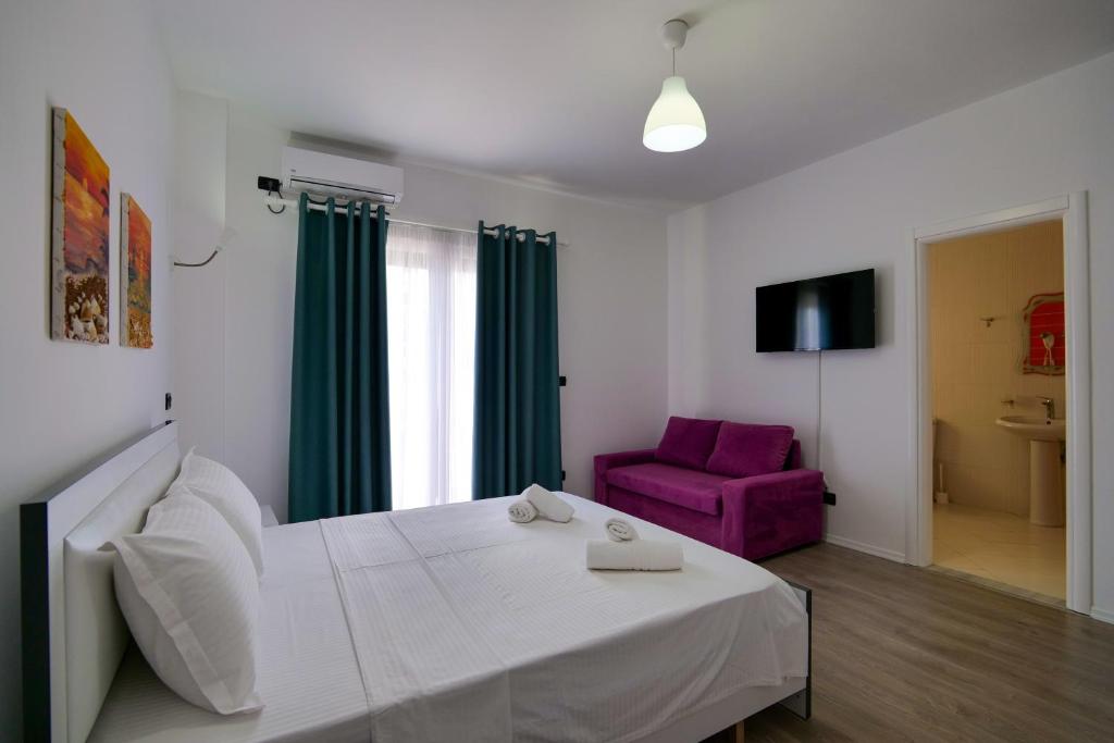 Postel nebo postele na pokoji v ubytování El Mare Hotel