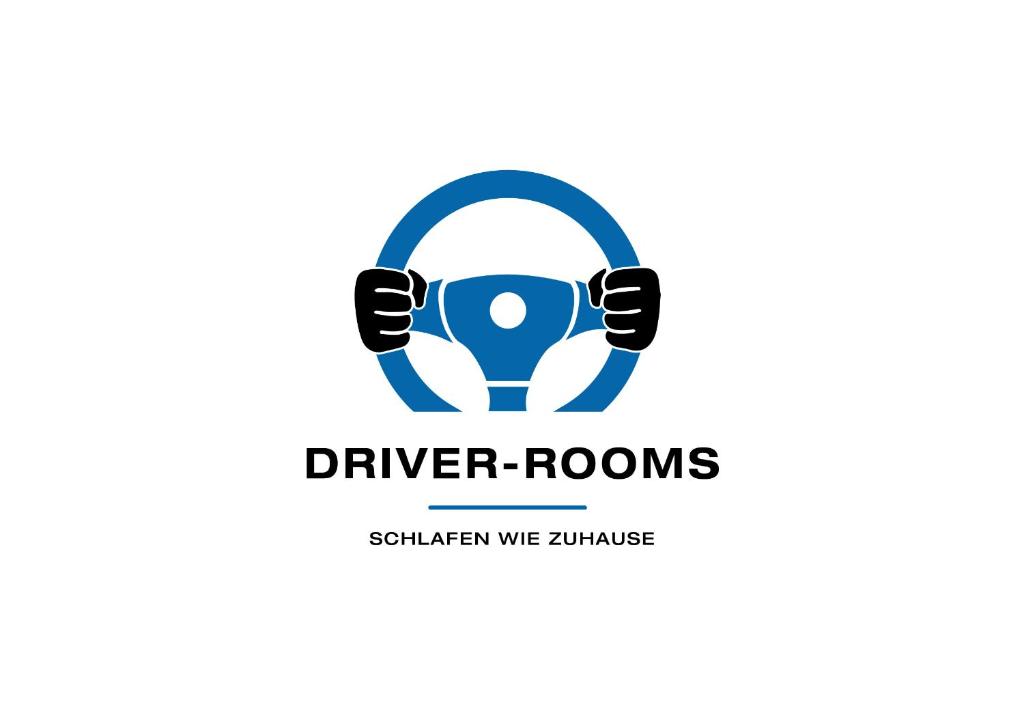 a sign of diver rooms with a pair of headphones at DRIVER ROOMS in Nuremberg