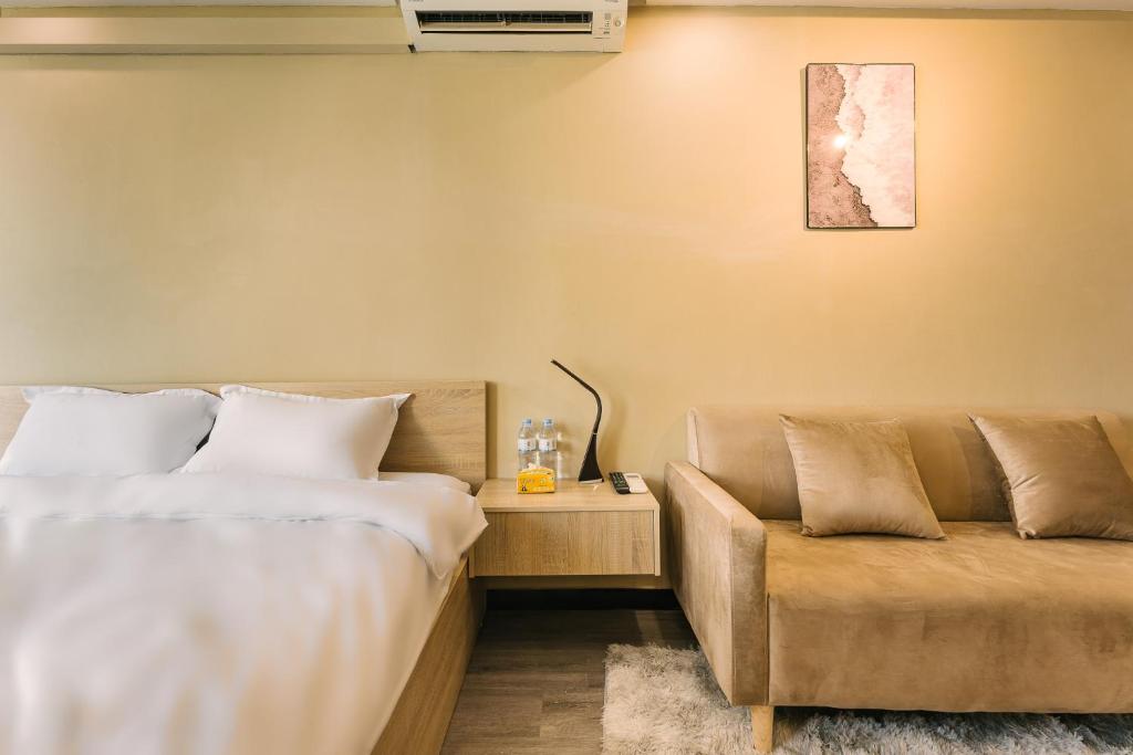 Postel nebo postele na pokoji v ubytování Hanoi-Oi Homestay Cau Go