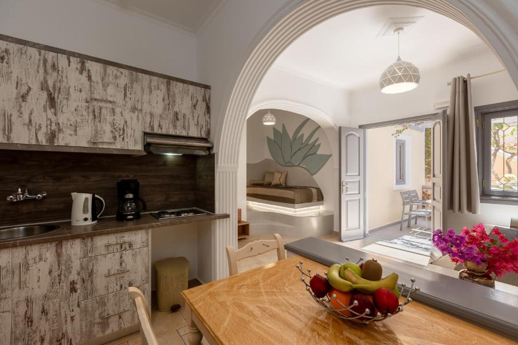 A kitchen or kitchenette at Polydefkis Hotel