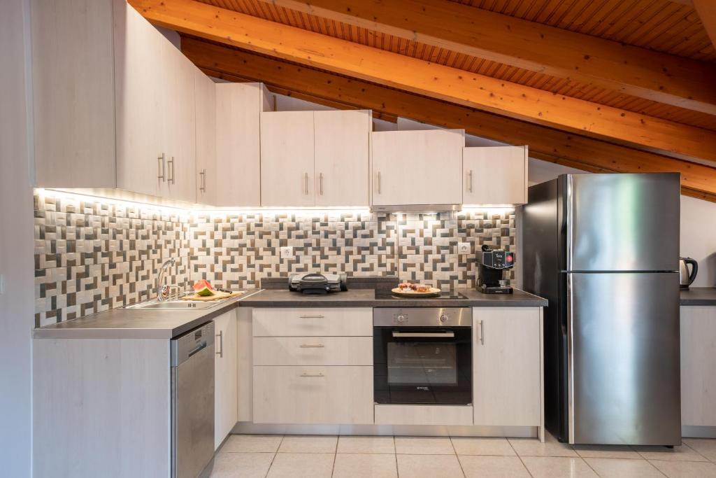 Kuchyň nebo kuchyňský kout v ubytování La perla loft