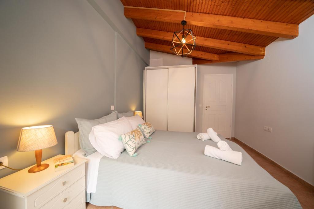 Postel nebo postele na pokoji v ubytování La perla loft