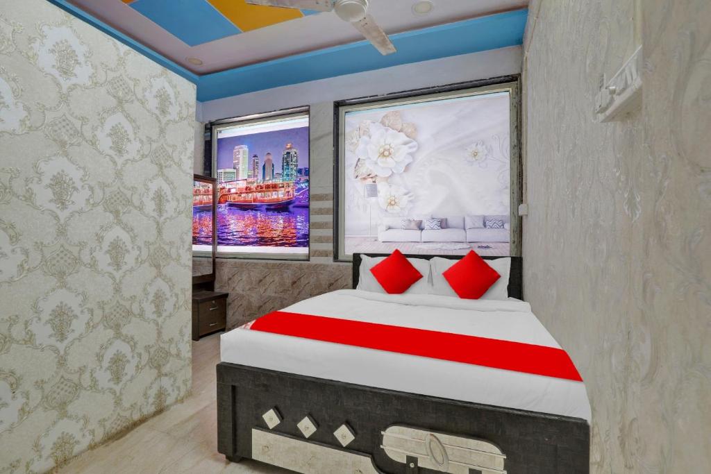 Ein Bett oder Betten in einem Zimmer der Unterkunft POP Hotel Dk Guest House