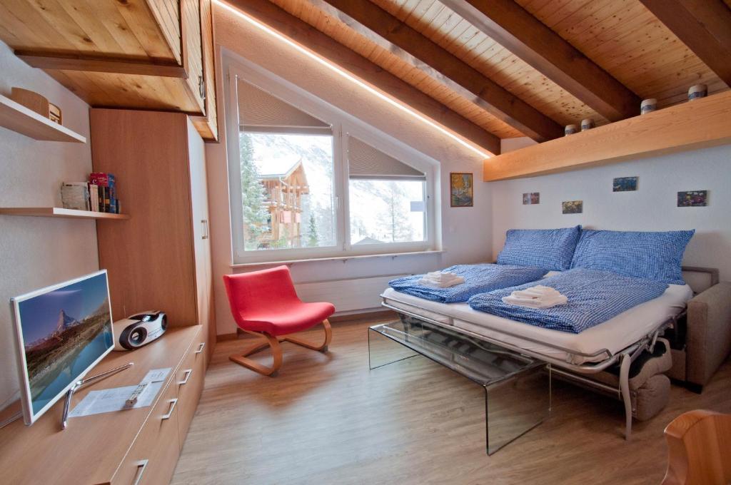 TV a/nebo společenská místnost v ubytování Haus Bodmen A, Studio Riffelsee