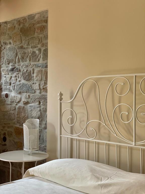 Łóżko lub łóżka w pokoju w obiekcie Agriturismo Piano di Andrea
