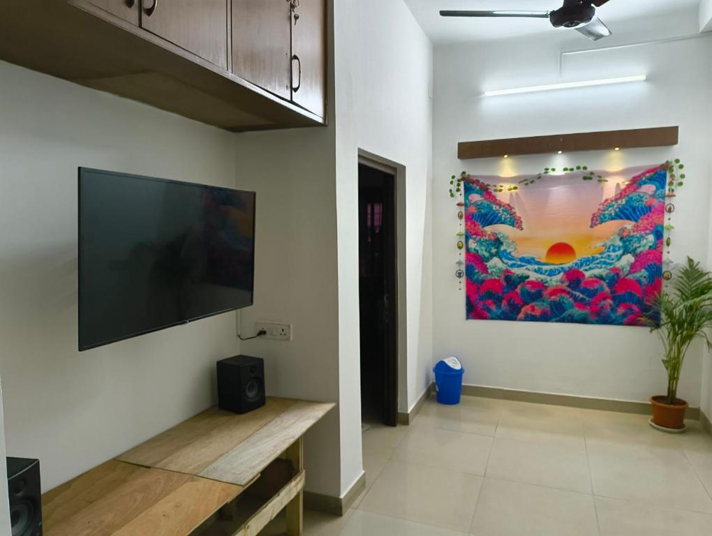 TV a/nebo společenská místnost v ubytování Calcutta Backpackers
