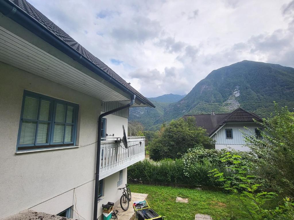 a balcony of a house with a view of a mountain at Apartment Luka at Soča & Koritnica confluence in Bovec