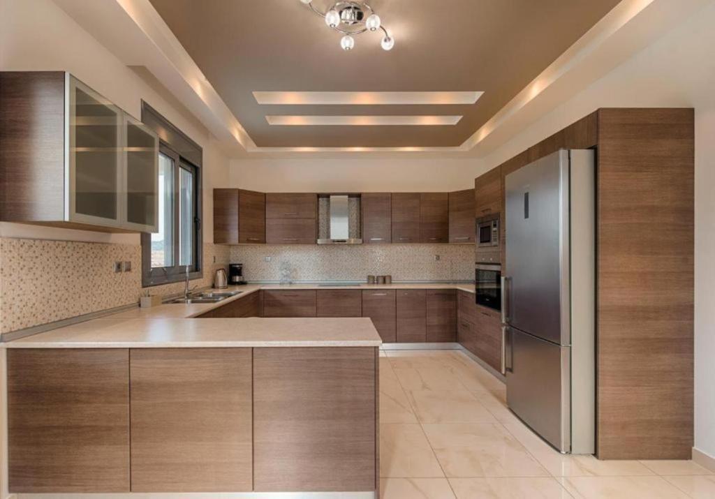 Kuchyň nebo kuchyňský kout v ubytování Villa Pandesia