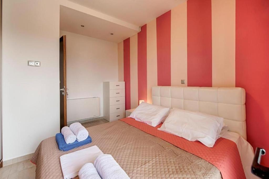 Postel nebo postele na pokoji v ubytování Villa Pandesia