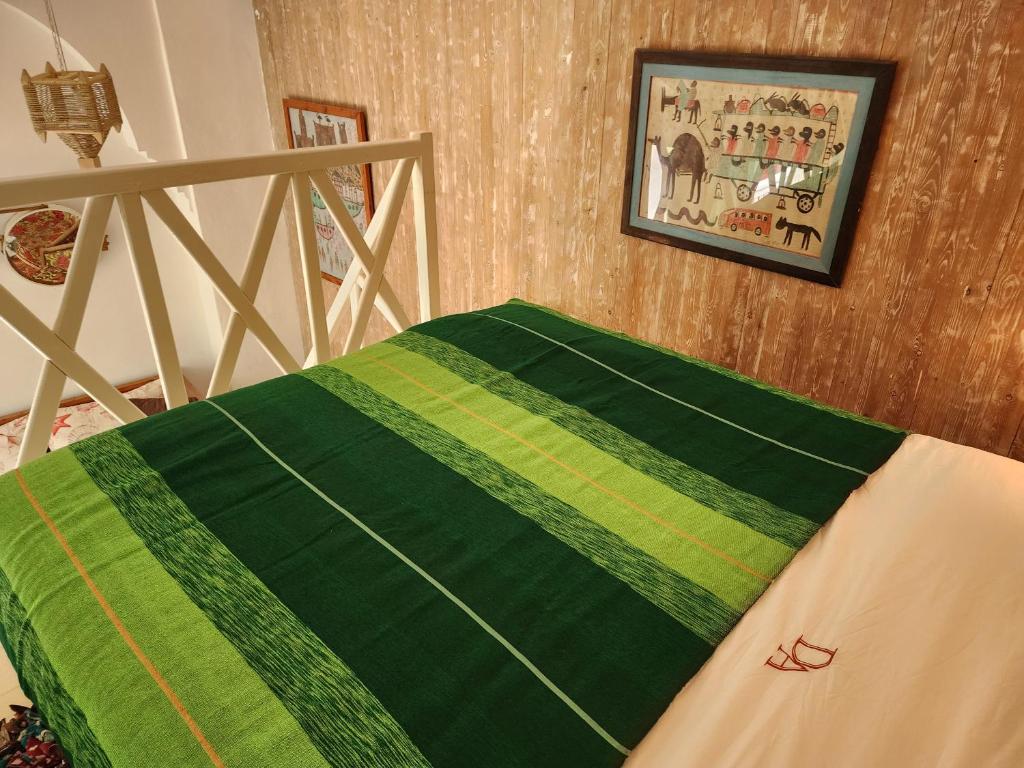 Postel nebo postele na pokoji v ubytování Dar Adul