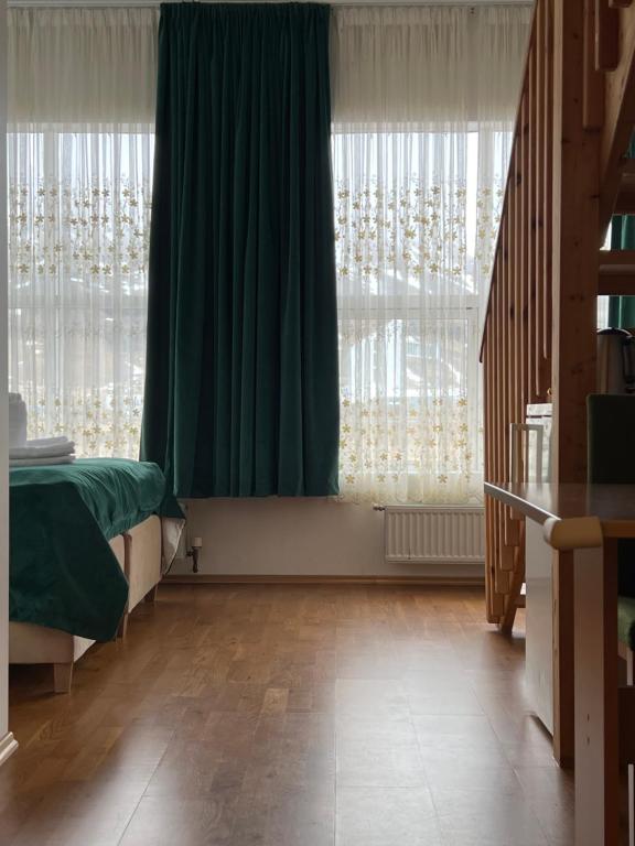 Postel nebo postele na pokoji v ubytování Media Luna Guesthouse