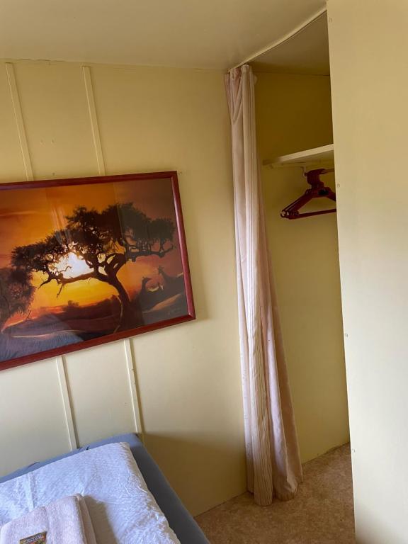 Postel nebo postele na pokoji v ubytování Tiny House 2 Erwachsene 2 Kinder