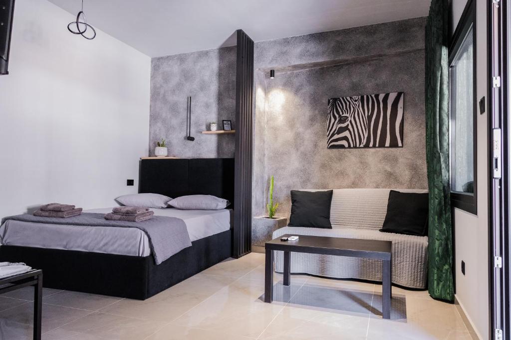 Postel nebo postele na pokoji v ubytování Frourio Lodge A3