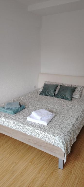 Postel nebo postele na pokoji v ubytování Župski TRG