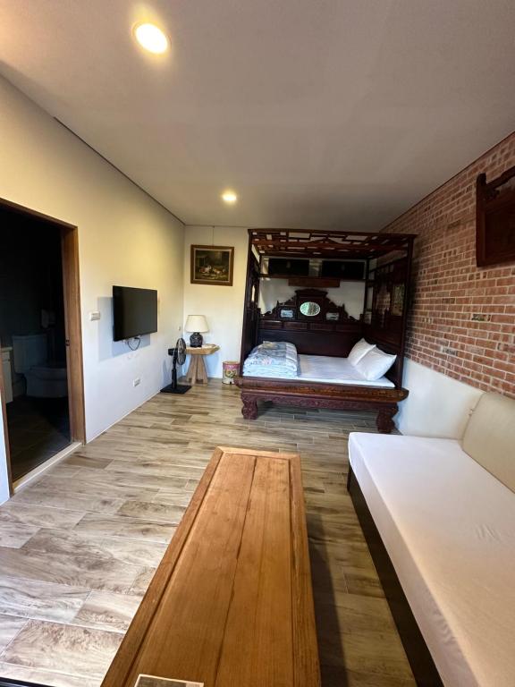 Katil atau katil-katil dalam bilik di SeeU Coffee and B&B