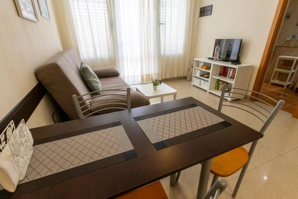TV a/nebo společenská místnost v ubytování Apartment Los Hibiscos