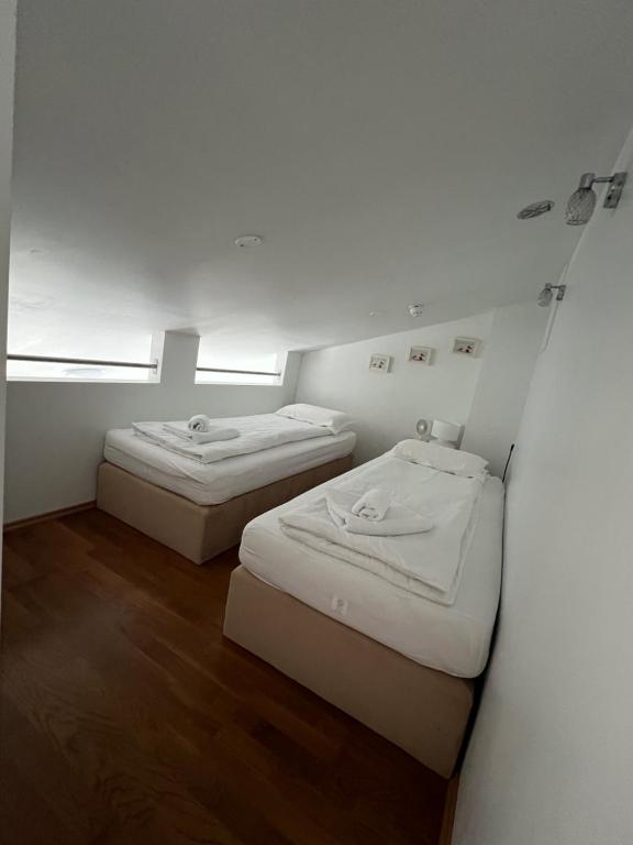 Postel nebo postele na pokoji v ubytování Media Luna Guesthouse