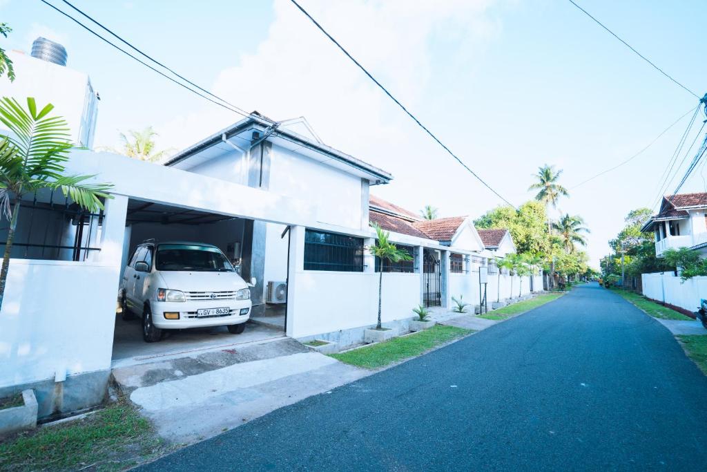 a car parked in the garage of a house at The Koarale Bungalow in Matara