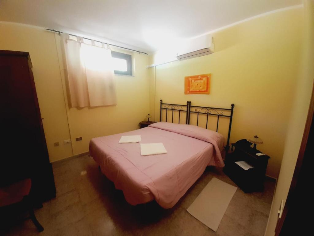 Postel nebo postele na pokoji v ubytování Hotel Sant'elene