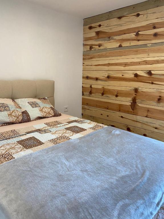 Postel nebo postele na pokoji v ubytování Tiny house Neny Fruška gora