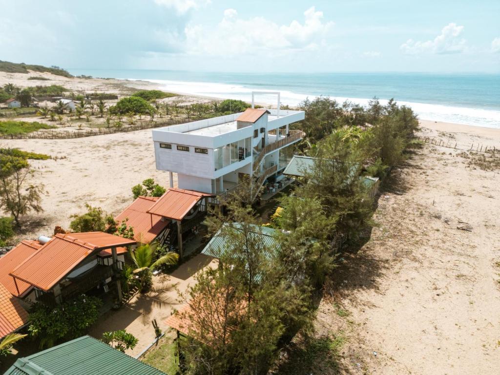 an aerial view of a house on the beach at Stay Golden in Arugam Bay