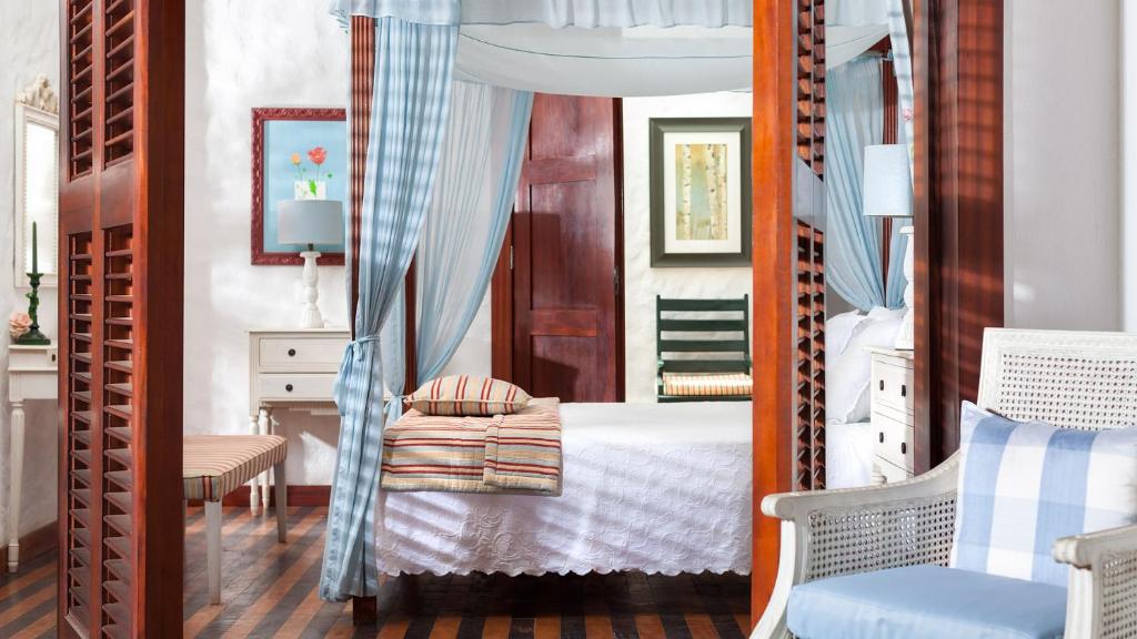 Postel nebo postele na pokoji v ubytování Casa de São José Hotel Boutique