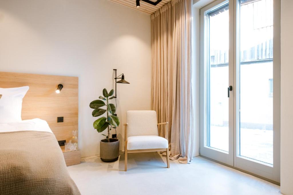 Postel nebo postele na pokoji v ubytování Studio Nummer Zwei