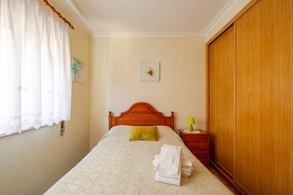 Postel nebo postele na pokoji v ubytování Remédios Apartment