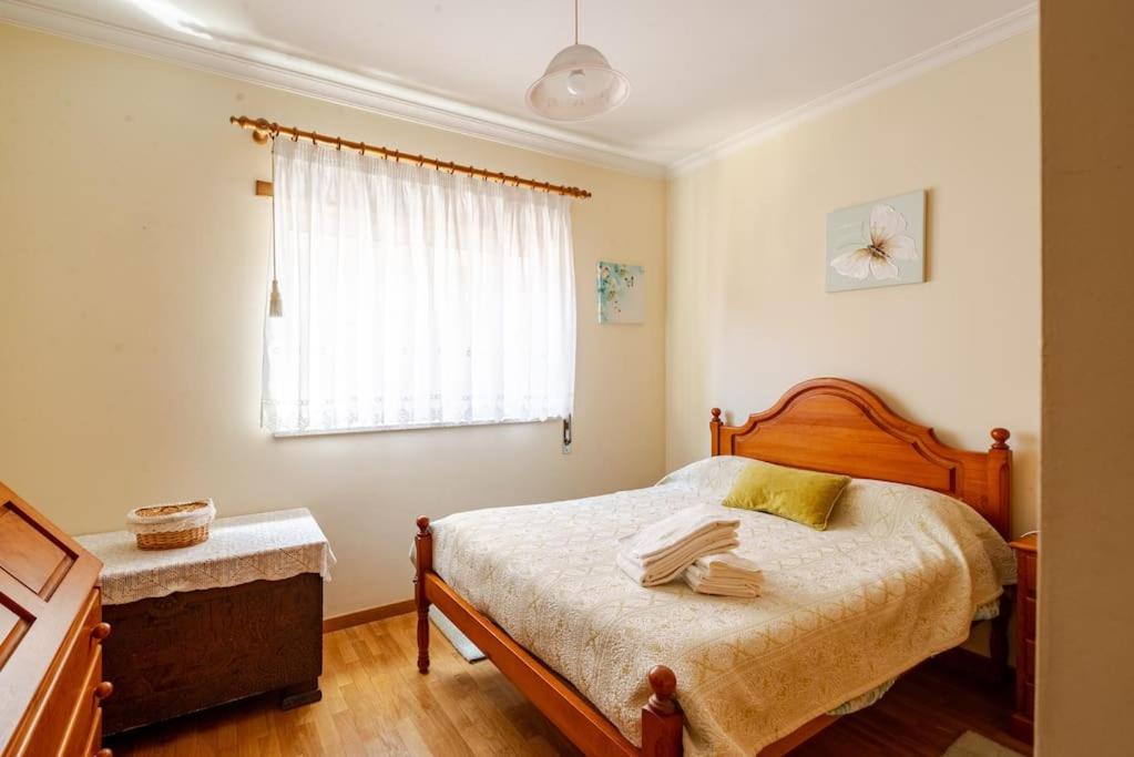 Postel nebo postele na pokoji v ubytování Remédios Apartment