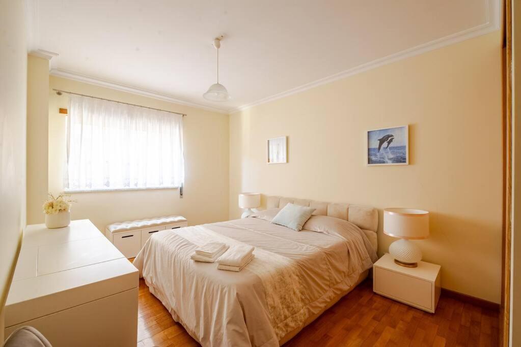 Postel nebo postele na pokoji v ubytování Remédios Apartment