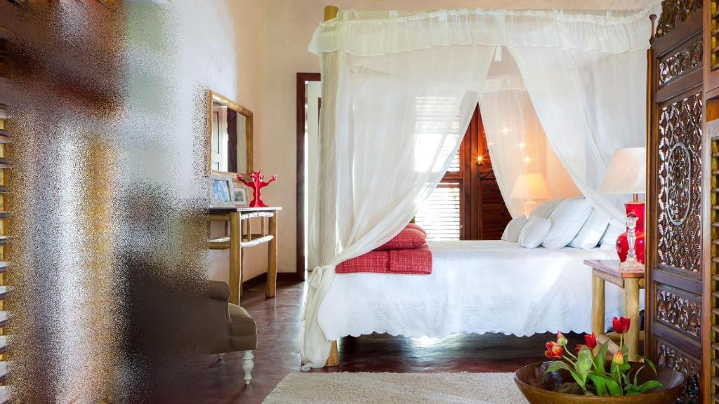 Postel nebo postele na pokoji v ubytování Casa de São José Hotel Boutique