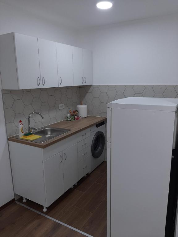 Kuchyň nebo kuchyňský kout v ubytování Apartman-Glavas I