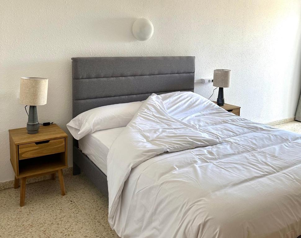 Postel nebo postele na pokoji v ubytování Hostal SolFina