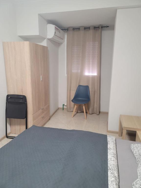 Posteľ alebo postele v izbe v ubytovaní Mini-hotel Casa de la Luz