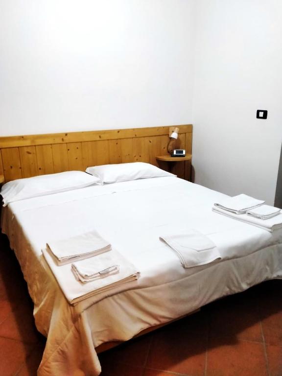 Postel nebo postele na pokoji v ubytování A' Porta i Frustere